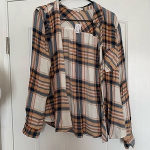 Blue, white, and orange Maurice’s flannel. Size medium